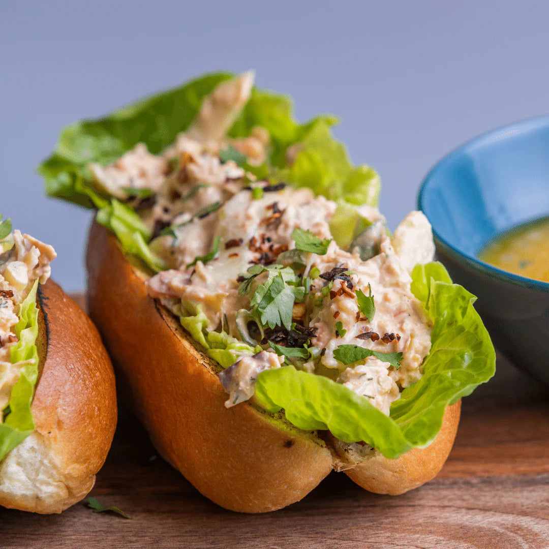 Flayvr Gourmet Lobster Roll Kit featuring fresh lobster salad in a toasted bun with lettuce