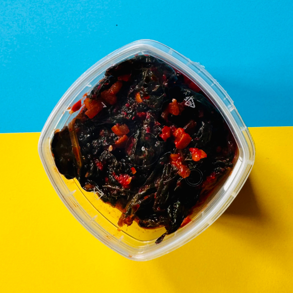 Flayvr Kale Kimchi 200ml with a spicy blend of fermented kale and vegetables in a clear container