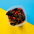 Flayvr kale kimchi 200ml in a clear container with vibrant peppers for a flavorful ferment